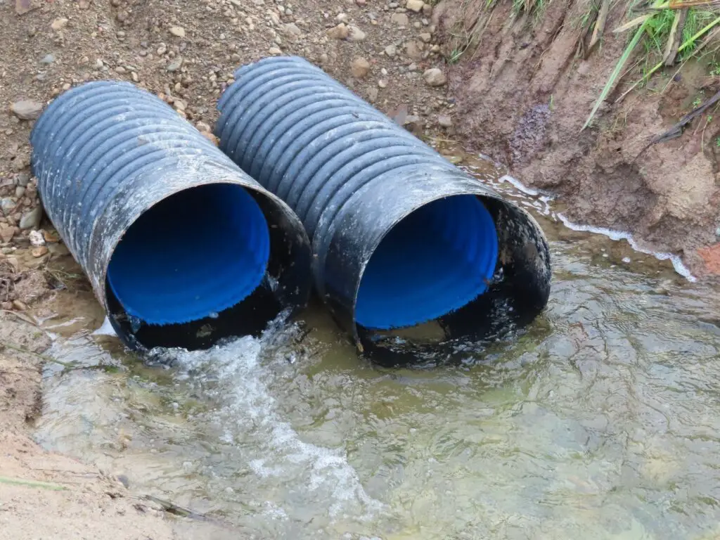 Culverts, a barrier to fish migration, installed in a stream feeding into River Owenogarney