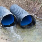 Culverts, a barrier to fish migration, installed in a stream feeding into River Owenogarney