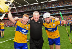 Tommy Corbett celebrating the All-Ireland final win with Shane Meehan and Cian Galvin